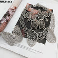 Silver jewelry set on a magazine page