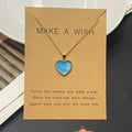 Necklace with blue heart pendant on a 'Make a Wish' card