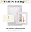 Jewelry packaging set with foam bags, box, and polish cloth on a white background.