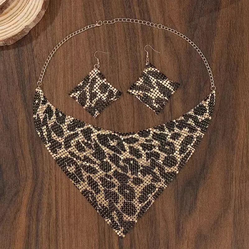 Jewelry set with necklace and earrings on a wooden surface