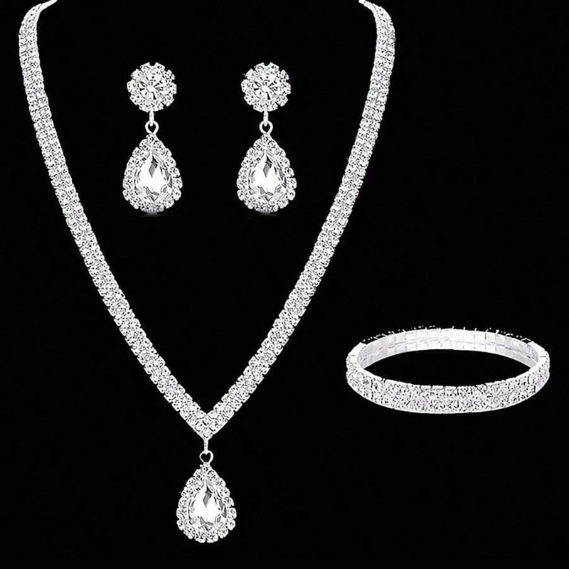 Jewelry set with necklace, earrings, and bracelet on a black background