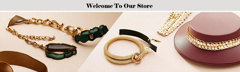 Jewelry including bracelets and necklaces on a white surface with 'Welcome To Our Store' text.