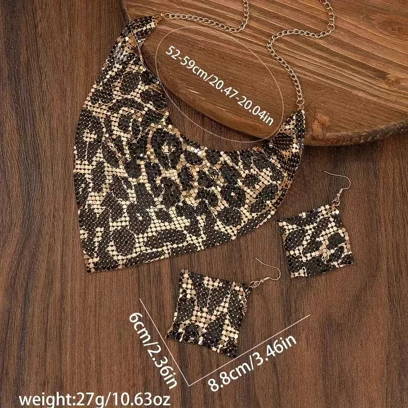 Leopard print jewelry set including necklace, bracelet, and earrings on a wooden surface with measurements.