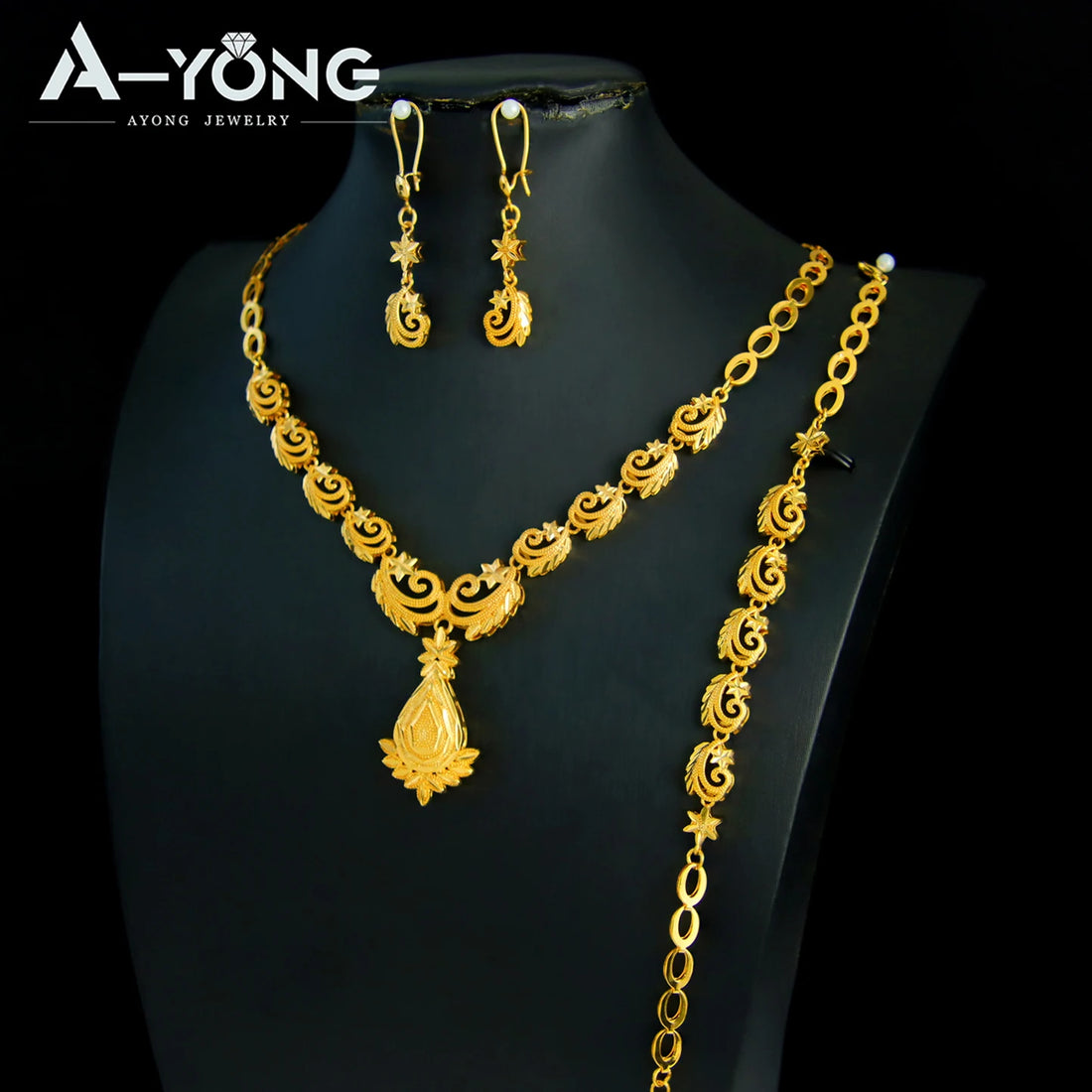 Collage of gold jewelry sets on mannequin heads with A-Yong Jewelry logo.